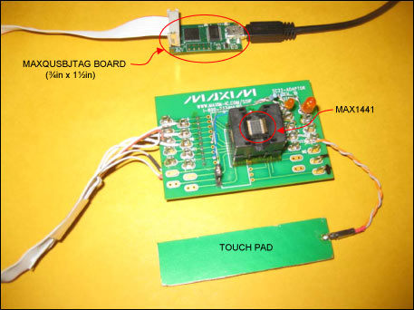 Figure 2. MAX1441 application board and MAXQUSBJTAG-KIT connection setup.